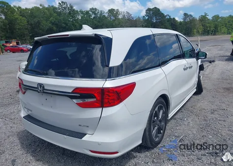 2023 Honda Odyssey Elite z USA, uszkodzony, nr VIN 5FNRL6H97PB047753